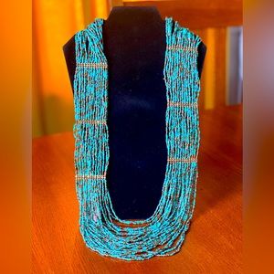 Beaded turquoise and gold like large necklace